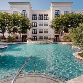 a pool in front of a building