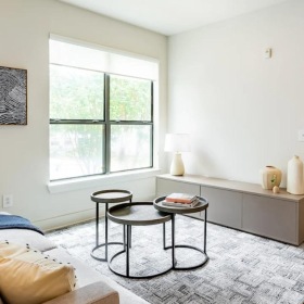 a living room with a couch and a table